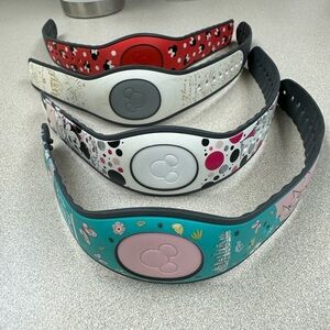 Lot of Disney magic bands. All used. Adult size adjusts to child size